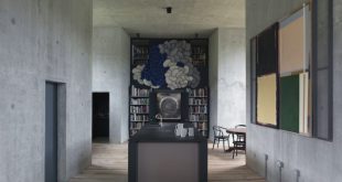 Minimalist Farmhouse In Raw Concrete With Bold Art - DigsDi