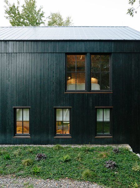 A Passive House and "Sauna Tower" Join a 19th-Century Barn in the .