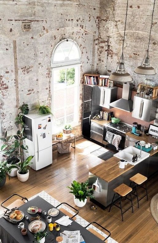 Inspired Spaces | Kitchen | Exposed Brick | Wood Countertops .