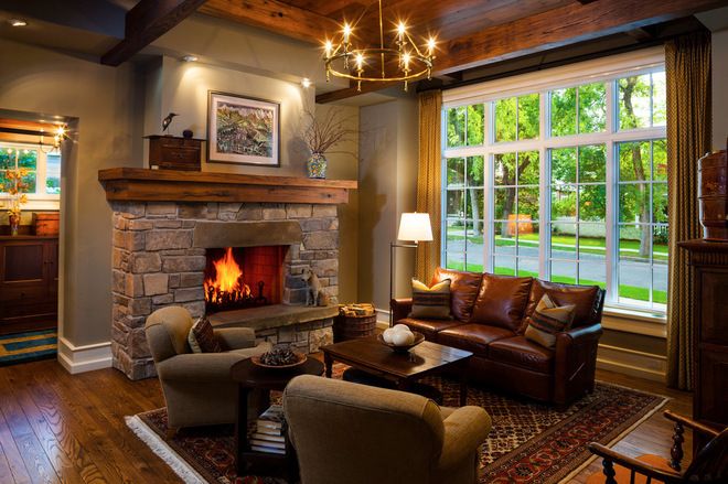 Formal lounge with large fire place and big window. craftsman .