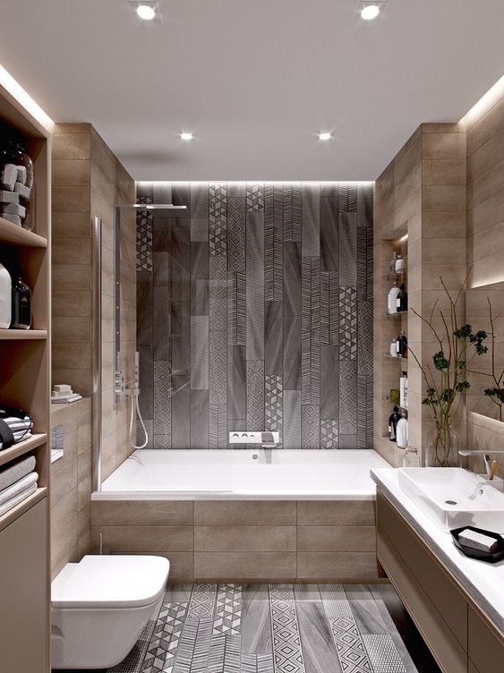 a minimalist bathroom done with wood look tiles and mosaic ones on the floor and bathtub wall for a pattern