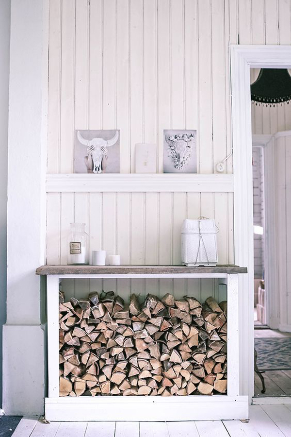 Indoor console table with firewood storage