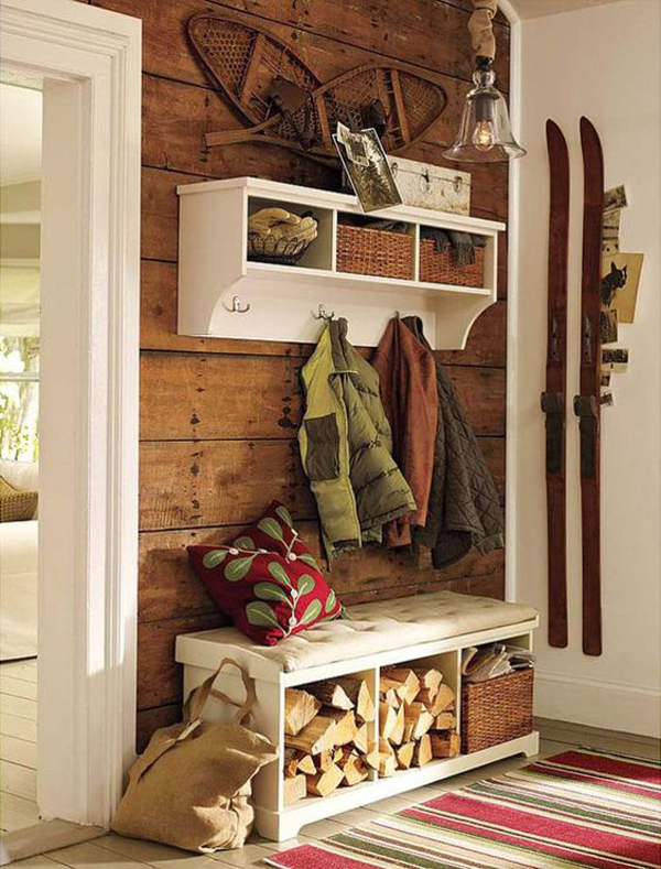 Farmhouse entrance with firewood storage under the bench