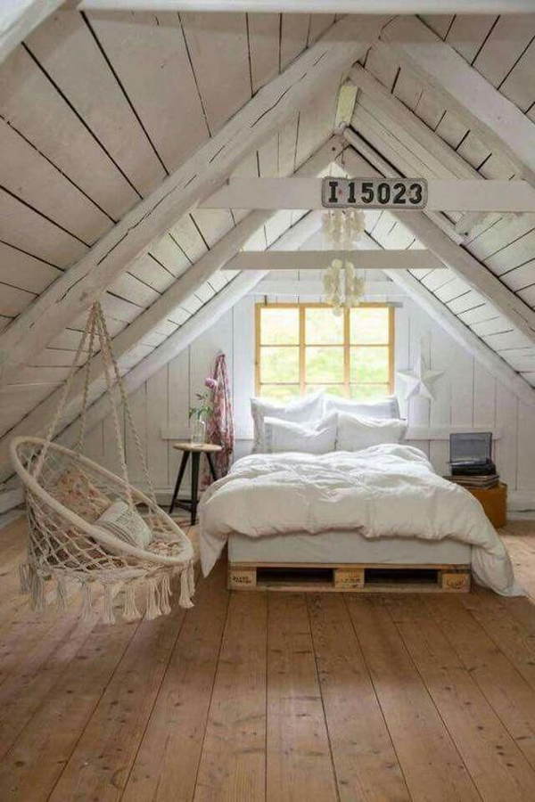 Vintage style wooden attic bedroom