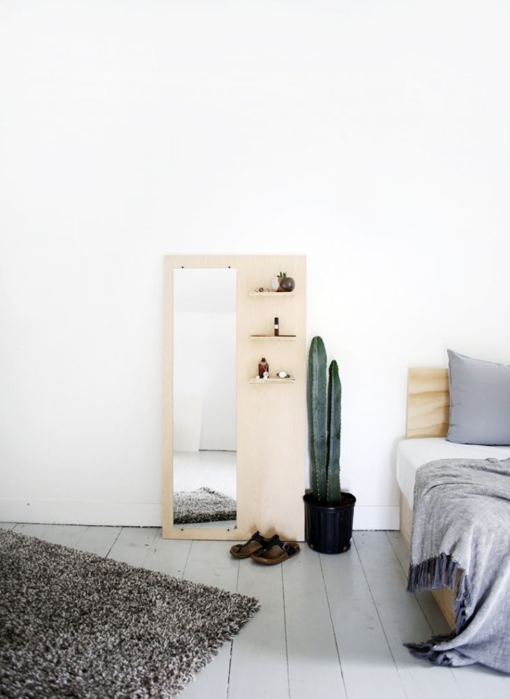 Leaning mirror with shelf