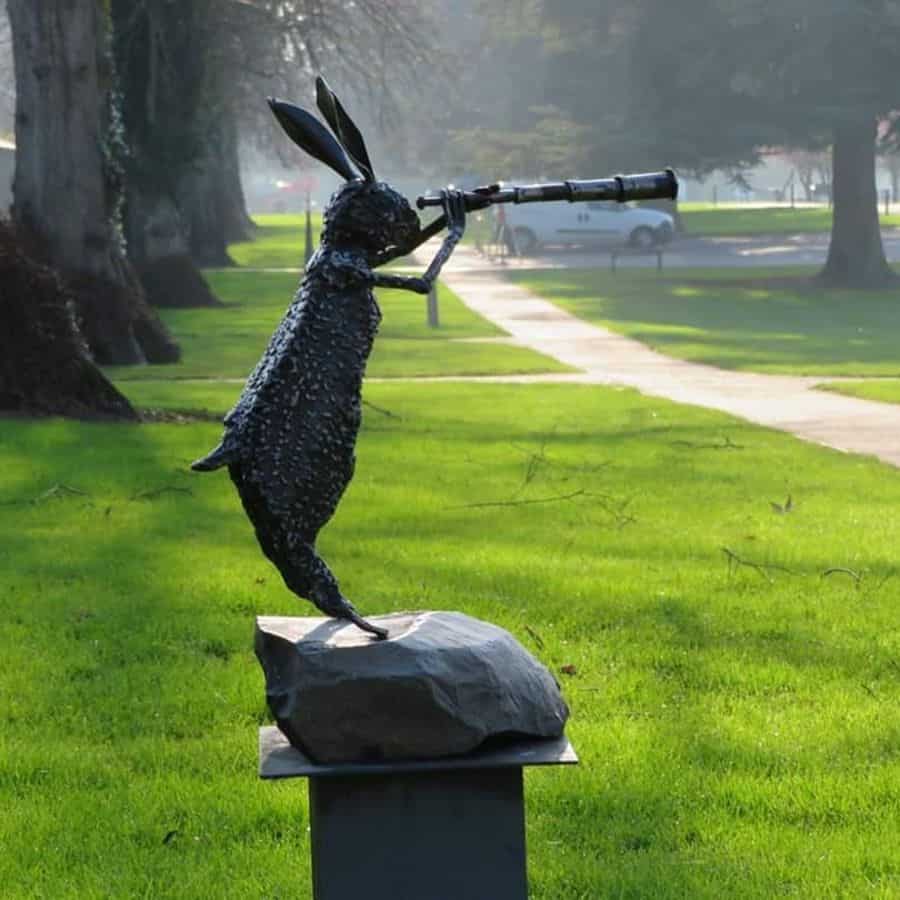 Rabbit with telescopic garden statue 